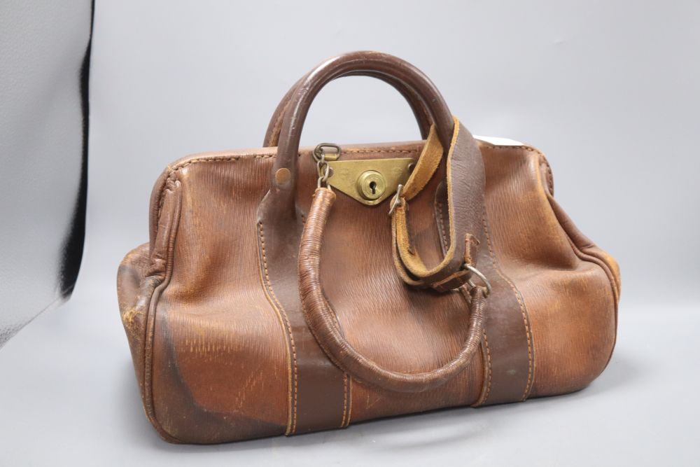 Two Gladstone type bags, one in crocodile skin